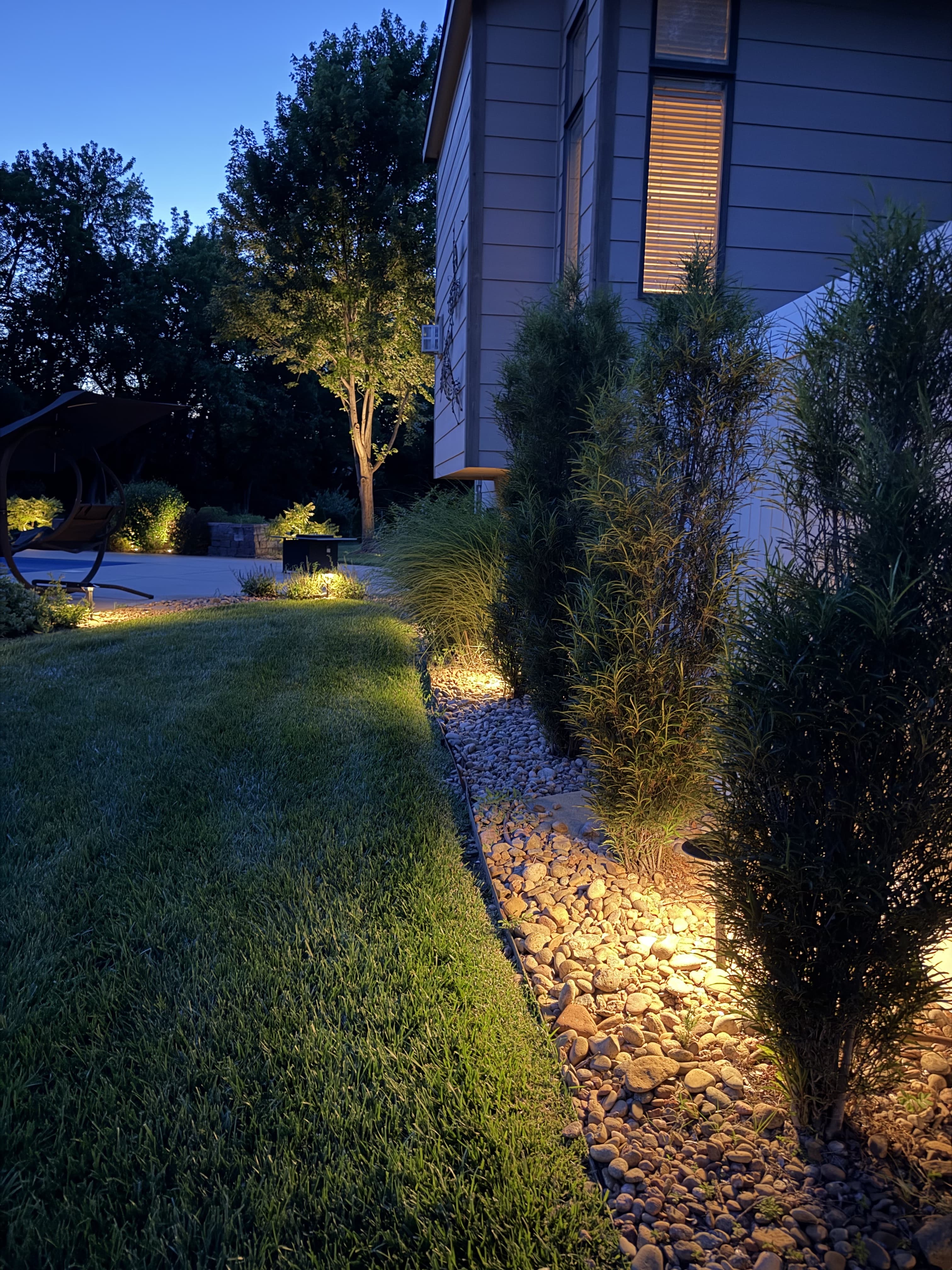 Reeds Cove front architecture with warm uplighting